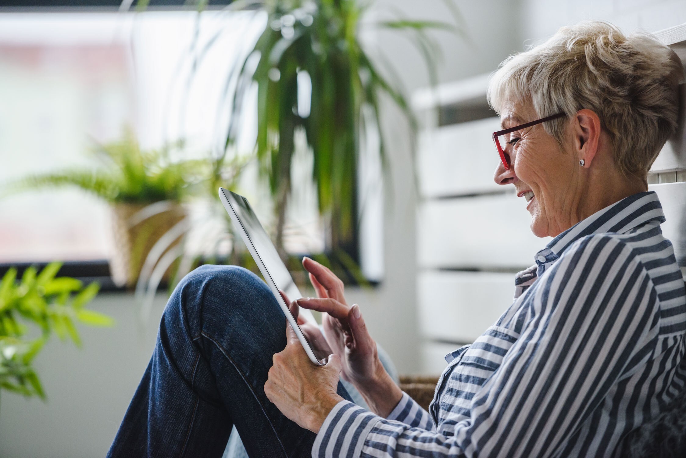 Woman accessing Digital Front Door from home
